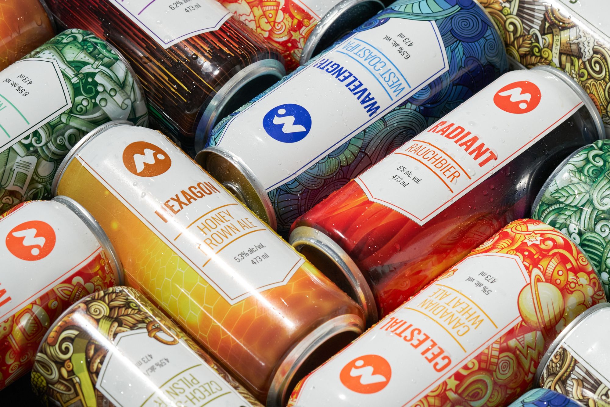 A colourful pile of Meta cans